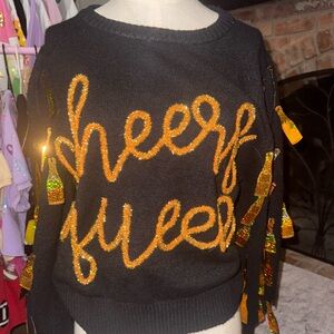 QUEEN OF SPARKLES Black Sweater with Gold Accents